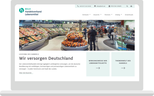 Laptop-Ansicht des Sliders mit einem Foto aus einem Supermarkt auf der Startseite von BVLH